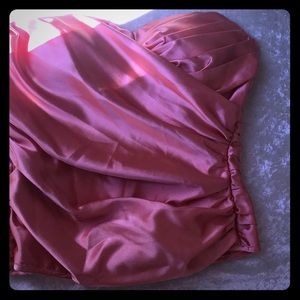 Women’s peach strapless top.